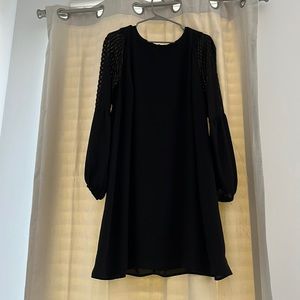 Maurice’s black dress